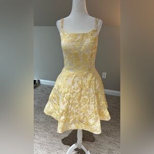 Elegant Yellow Embroidered Dress with packets